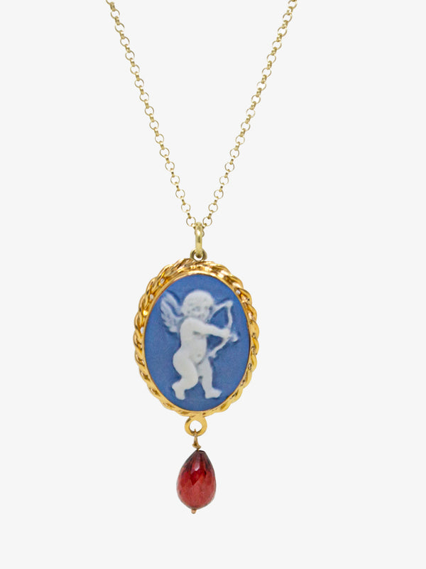 Sky blue cameo necklace portraying Cupid, set in gold over silver and enhanced with a dangling garnet.