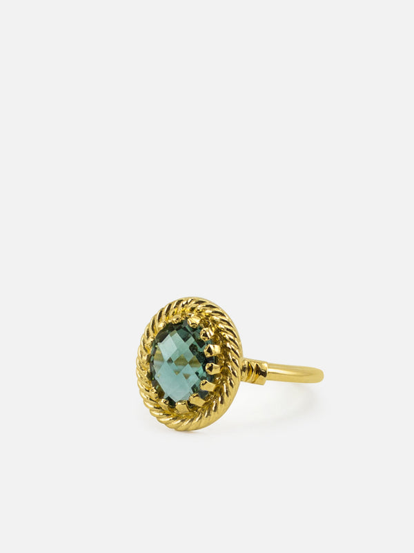 The Vintouch Jewels Luccichio Green Quartz Stacking Ring showcases a round, faceted green quartz in a rope-style 18k gold over sterling silver bezel, displayed against a plain white background.