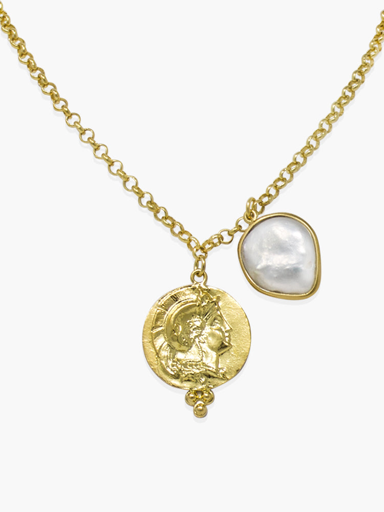 The Achilles Necklace With Baroque Pearl by Vintouch Jewels features a gold-plated silver chain with two pendants—a profile coin and a baroque pearl—offering a timeless look.