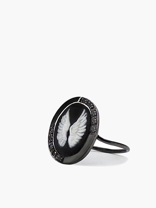Wings cameo ring by Vintouch Jewels hand-carved from porcelain and set in gunmetal silver embellished with black diamonds