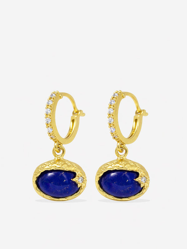 Handcrafted lapis lazuli drop hoop earrings in gold plated sterling silver with horizontal oval cabochon stones and refined diamond accents