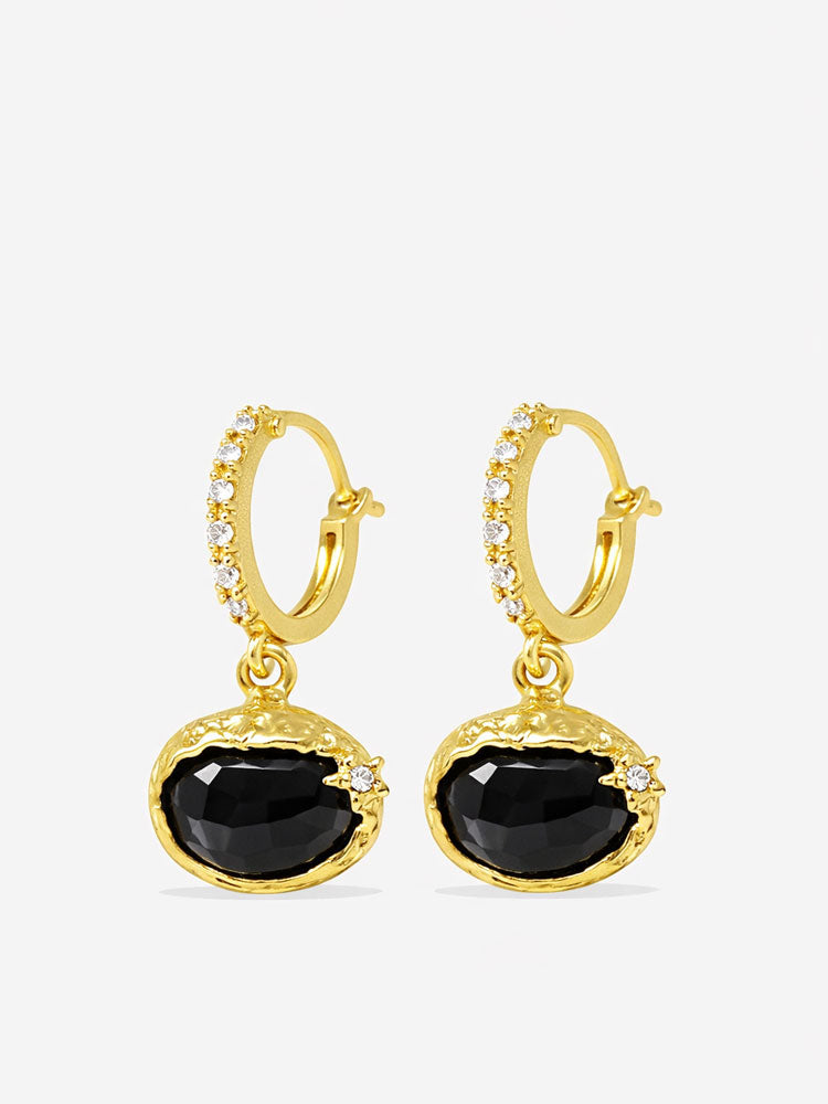 Handcrafted onyx drop hoop earrings in gold plated sterling silver with oval cabochon stones and refined diamond accents