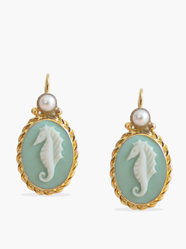 Seahorse cameo earrings, hand-carved from porcelain and set in gold vermeil. 