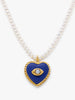 Natural cultured pearl necklace with lapis-blue heart pendant, opal evil eye and 18k gold-plated silver details.