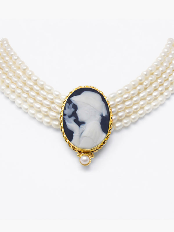 Cameo pearl choker necklace with woman holding bird, five strands of pearls and gold-plated silver setting, handmade Italian jewelry