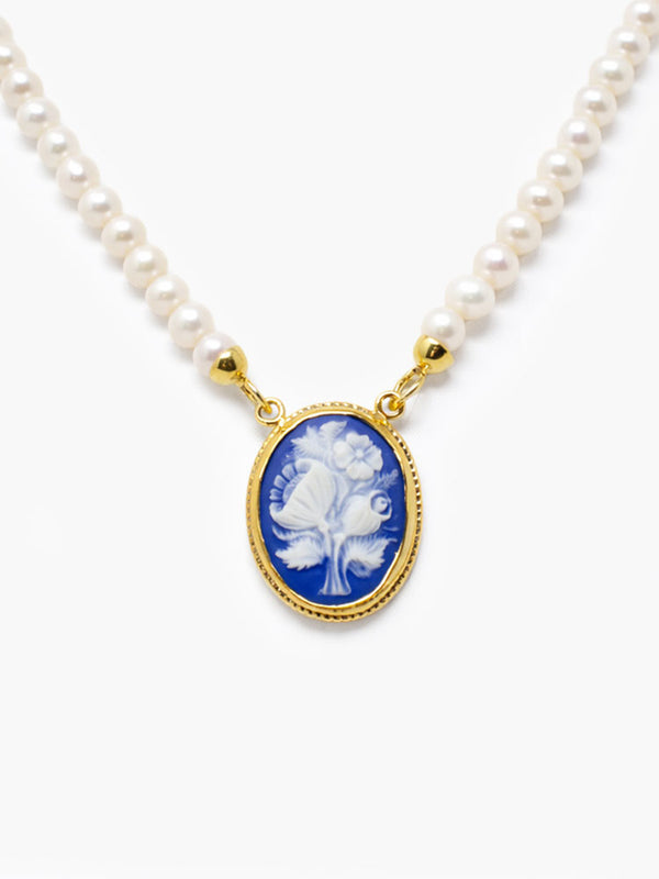 Blue cameo pendant with wildflower design on freshwater pearl necklace in gold-plated silver, handmade Italian jewelry