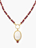 18k gold-plated sterling silver necklace with natural garnet beads and white porcelain cameo pendant depicting the Three Graces, inspired by Botticelli’s Primavera.