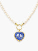 Handcrafted pearl necklace with blue heart-shaped porcelain cameo pendant depicting two birds on flowering branches, mounted in 18k gold-plated sterling silver