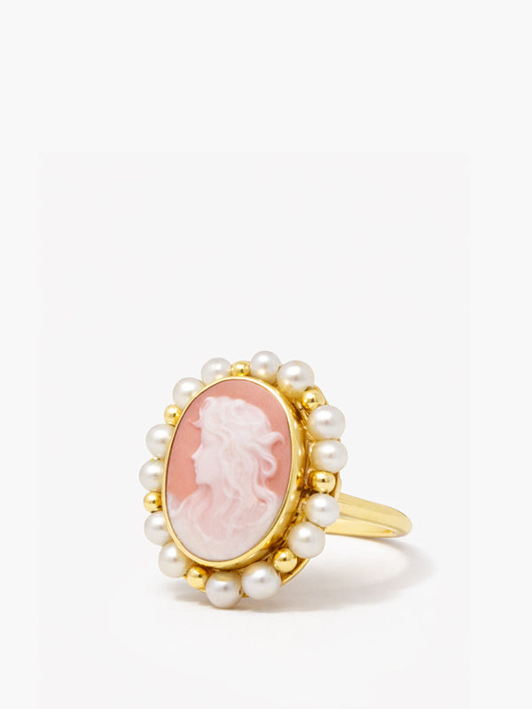 Hand-carved pink porcelain cameo ring with pearls in gold-plated sterling silver, handmade Italian jewelry inspired by Victorian eleganceSelect 80 more words to run Humanizer.