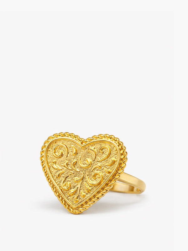 Heart-shaped gold vermeil statement ring with ornate rococo-inspired engravings handcrafted in Italy