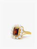 Handcrafted 18k gold-plated silver ring with natural garnet framed by hand-set freshwater pearls, inspired by Victorian elegance.