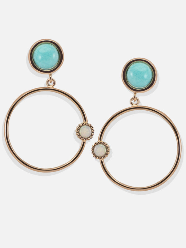 Inspired by satellites orbiting around their star, these hoop earrings are made with vibrant amazonite and glittering opal stones that are carefully handset in 18k rose gold over sterling silver. Handcrafted in our workshop in Italy, they will look just as chic with your daytime outfit as they will do with your eveningwear. 