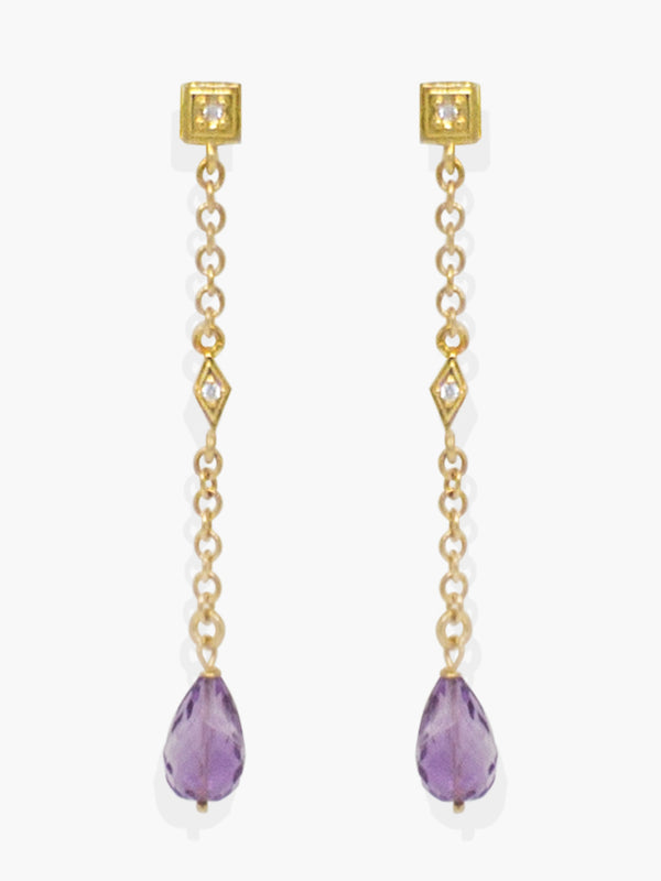 Here at Vintouch we're constantly focused on environmental sustainability, so we strive to craft our jewelry pieces from responsibly sourced materials. These earrings are inspired from Deco style jewelry, cast in our workshops in Italy from 18k gold-plated silver strung with faceted, ethically sourced amethyst and AAA grade cubic zirconia that shimmer in the light. 