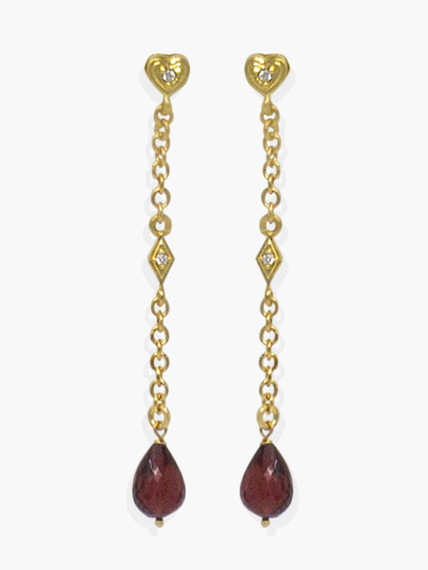 Here at Vintouch we're constantly focused on environmental sustainability, so we strive to craft our jewelry pieces from responsibly sourced materials. These earrings are inspired from Deco style jewelry, cast in our workshops in Italy from 18k gold-plated silver strung with faceted, ethically sourced garnet and AAA grade cubic zirconia that shimmer in the light. Featuring a dainty little heart stud that make them the perfect gift for someone you love.   Garnet is the birthstone for January. 