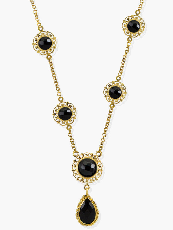 Inspired by the antique goldsmith technique known as 'Filigrana' - consisting in binding thin precious metal wires in order to create a pierced structure around the gemstone - the 'Taormina' necklace is handmade from 18-karat Gold Over Sterling Silver enriched by the vibrance of different sized and shaped onyx stones. Style this amazing necklace with your daytime tailoring or evening outfits either alone or stacked with the matching earrings. 