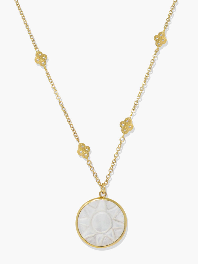 Vintouch's 'Le Soleil' gold-plated hand-carved Mother Of Pearl pendant necklace featuring glittering AAA grade white zircons.