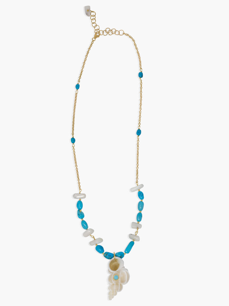 Turquoise & White Coral necklace handmade in Italy by Vintouch Jewels. The necklace measures 18 up to 20 inches and it features turquoise, white coral beads and a Wentletrap shell charm marked with a turquoise bead