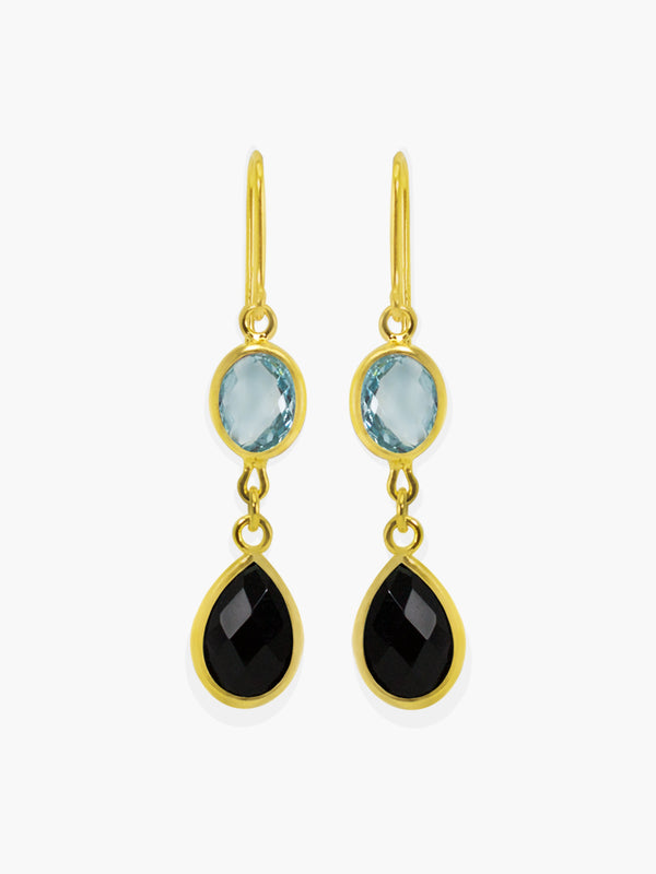 Amalfi Drop Earrings by Vintouch Jewels, set with sky blue topaz and black onyx. Available either in 14k yellow gold or 18k gold plated silver. 