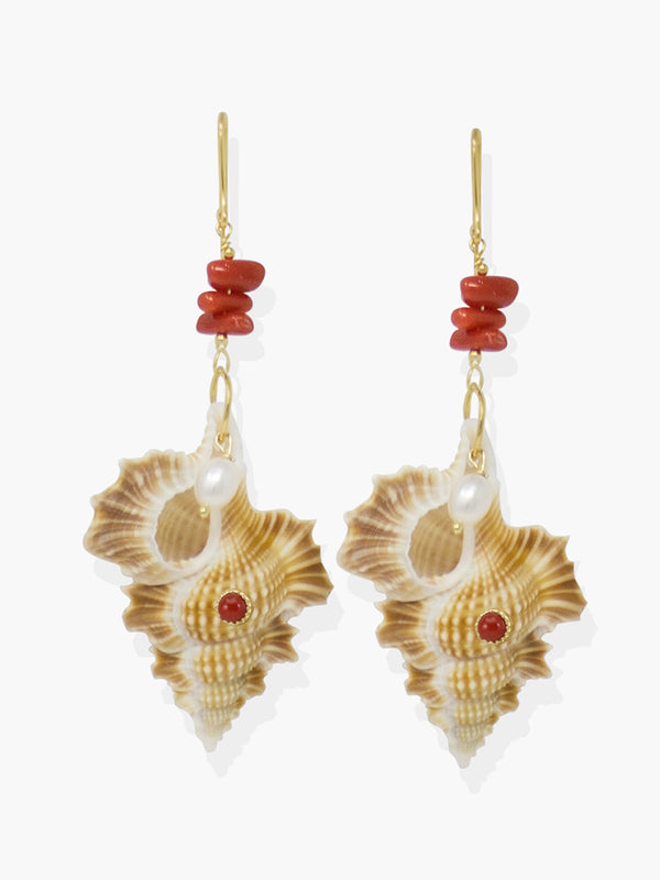 Featuring red coral and pearls, these earrings are cast from 18k gold over silver with a couple of cymatium shells whose shape reminds of Africa.